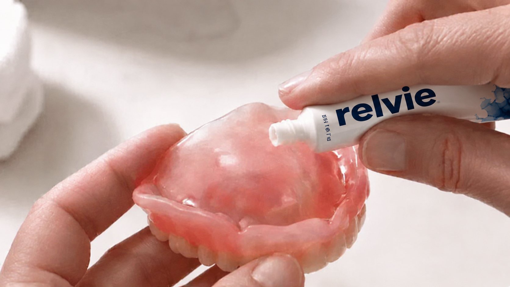 Relvie applied to inside of denture